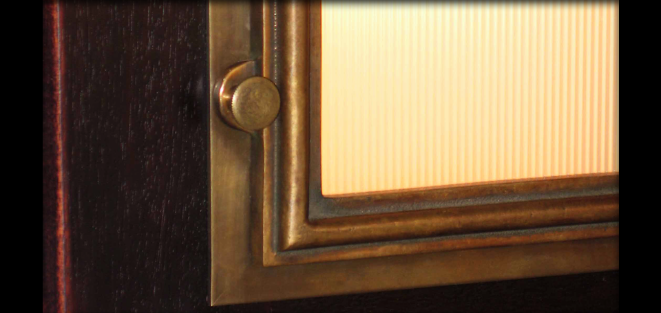 Detail of cast bronze sconce